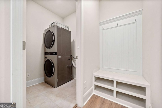 724 Broken Arrow, Waleska, GA 30183 - laundry room featuring estacked washer and dryer and baseboards