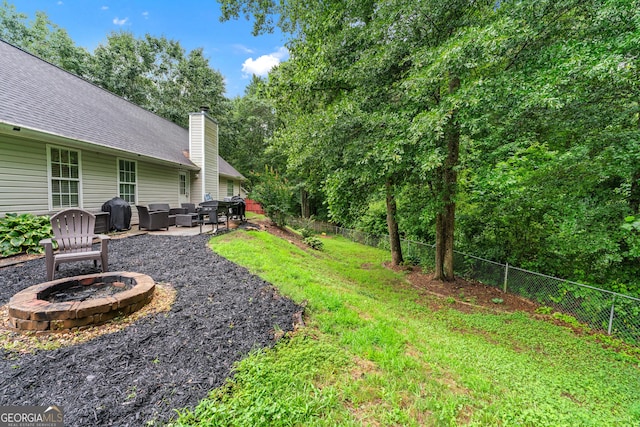 106 Kerby Cir, Braselton, GA 30517 - view of yard featuring a patio and an outdoor living space with a fire pit