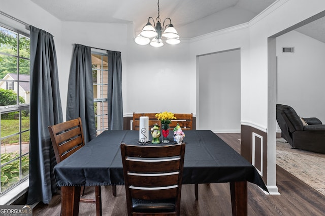 106 Kerby Cir, Braselton, GA 30517 - dining space with a chandelier, dark wood finished floors, and vaulted ceiling