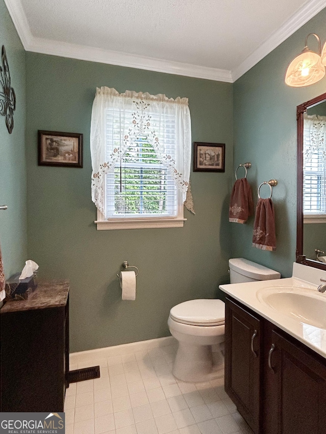 21 Picketts Rdg, Acworth, GA 30101 - bathroom with toilet, vanity, ornamental molding, and baseboards