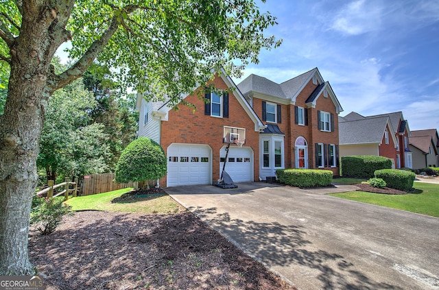 1124 Monarda Way NW, Acworth, GA 30102 - traditional-style house featuring concrete driveway, brick siding, and an attached garage