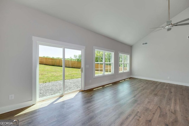 8380 Pleasant Grove Cir, Gainesville, GA 30506 - empty room featuring healthy amount of natural light, wood finished floors, ceiling fan, and high vaulted ceiling