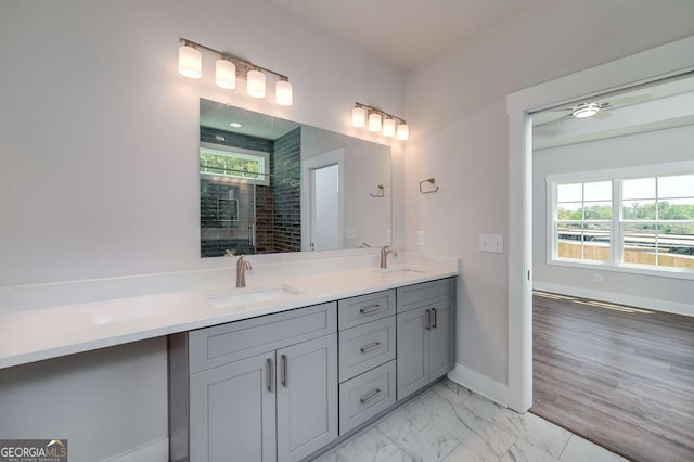 8380 Pleasant Grove Cir, Gainesville, GA 30506 - full bath featuring double vanity, a tile shower, and marble finish flooring