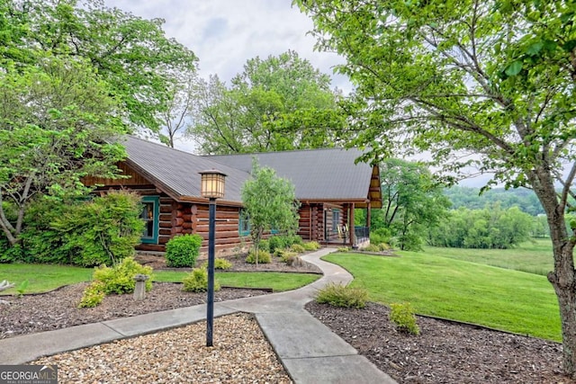 6487 W Old Highway 64 W, Warne, NC 28909 - log-style house with log exterior and a front yard