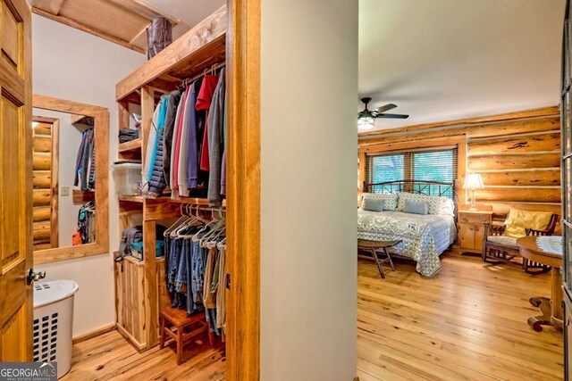 6487 W Old Highway 64 W, Warne, NC 28909 - spacious closet with hardwood / wood-style floors and a ceiling fan