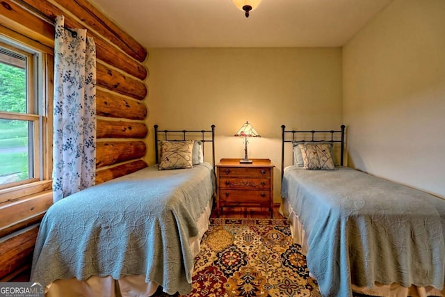 6487 W Old Highway 64 W, Warne, NC 28909 - bedroom with rustic walls