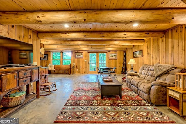 6487 W Old Highway 64 W, Warne, NC 28909 - living room featuring wooden ceiling with exposed beams, concrete floors, rustic walls, and wooden walls