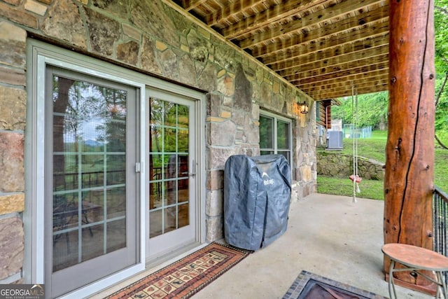6487 W Old Highway 64 W, Warne, NC 28909 - view of patio featuring cooling unit and a grill