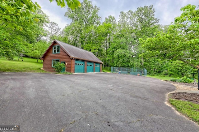 6487 W Old Highway 64 W, Warne, NC 28909 - garage with a detached garage and view of wooded area