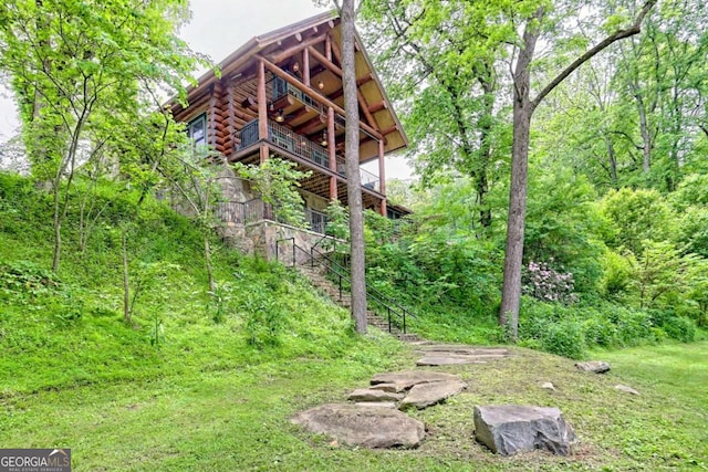 6487 W Old Highway 64 W, Warne, NC 28909 - view of yard featuring stairway and a wooden deck