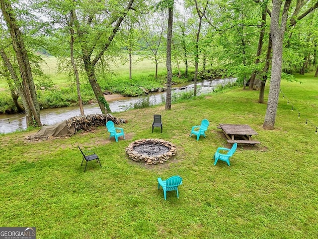 6487 W Old Highway 64 W, Warne, NC 28909 - view of grassy yard featuring a fire pit