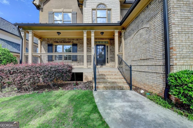 1054 Morgan Garner Dr SW, Lilburn, GA 30047 - entrance to property with brick siding and a porch