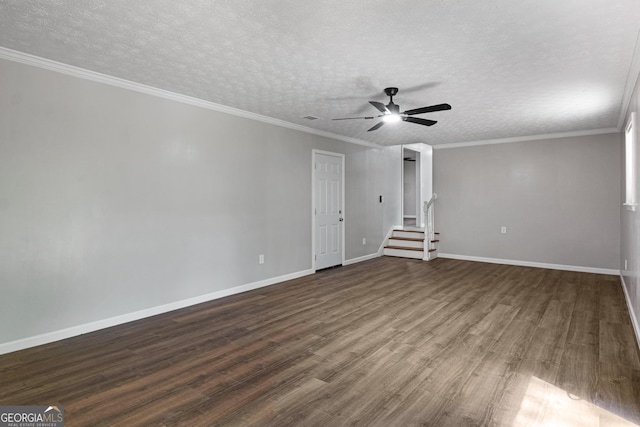 2894 Cushing Ct, Jonesboro, GA 30236 - empty room featuring dark wood finished floors, a ceiling fan, baseboards, stairs, and a textured ceiling