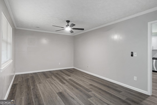 2894 Cushing Ct, Jonesboro, GA 30236 - empty room with a ceiling fan, dark wood-style flooring, baseboards, a textured ceiling, and ornamental molding