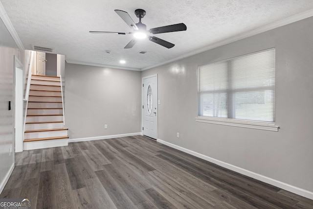 2894 Cushing Ct, Jonesboro, GA 30236 - unfurnished living room with ceiling fan, a textured ceiling, stairs, dark wood-style floors, and baseboards