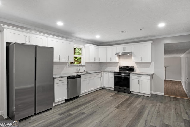 2894 Cushing Ct, Jonesboro, GA 30236 - kitchen with stainless steel appliances, a sink, white cabinetry, ornamental molding, and dark wood-style flooring