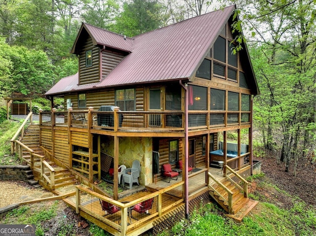 294 Oakwood Trl, Mineral Bluff, GA 30559 - rear view of property with stairway, a deck, and metal roof