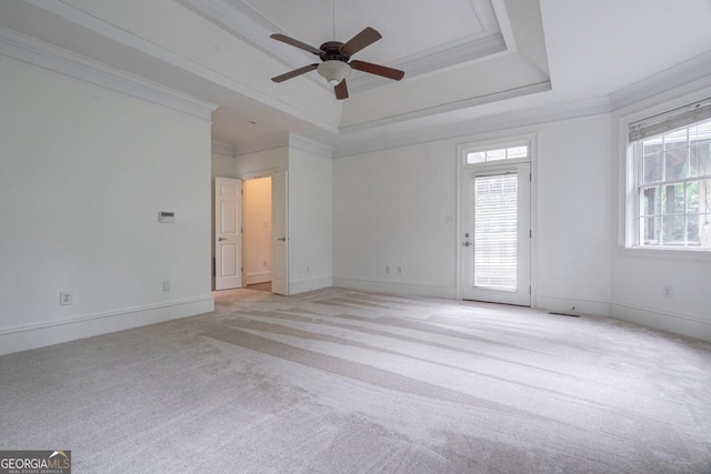 5620 Barnett Shoals Rd, Athens, GA 30605 - spare room featuring a tray ceiling, light carpet, a ceiling fan, and crown molding