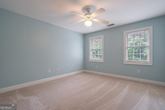 5620 Barnett Shoals Rd, Athens, GA 30605 - spare room with light colored carpet and a ceiling fan