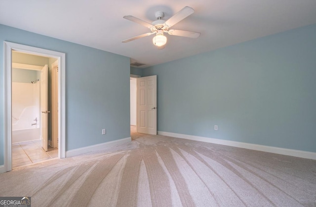 5620 Barnett Shoals Rd, Athens, GA 30605 - unfurnished bedroom featuring carpet floors, ceiling fan, and ensuite bath