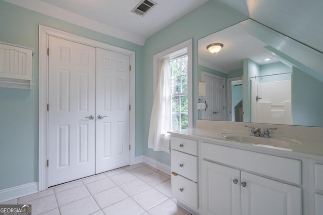 5620 Barnett Shoals Rd, Athens, GA 30605 - bathroom featuring vanity, tile patterned flooring, and a shower