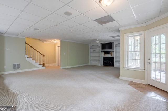 5620 Barnett Shoals Rd, Athens, GA 30605 - unfurnished living room featuring a fireplace, carpet flooring, ornamental molding, built in features, and stairway