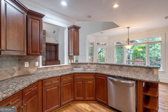 5620 Barnett Shoals Rd, Athens, GA 30605 - kitchen featuring dishwasher, light wood-type flooring, a peninsula, hanging light fixtures, and ornamental molding