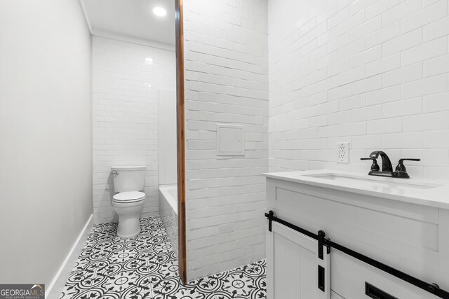 107 S Mulberry St, Statesboro, GA 30458 - bathroom featuring tile walls and vanity