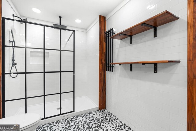 107 S Mulberry St, Statesboro, GA 30458 - bathroom featuring a shower stall, tile patterned floors, and recessed lighting