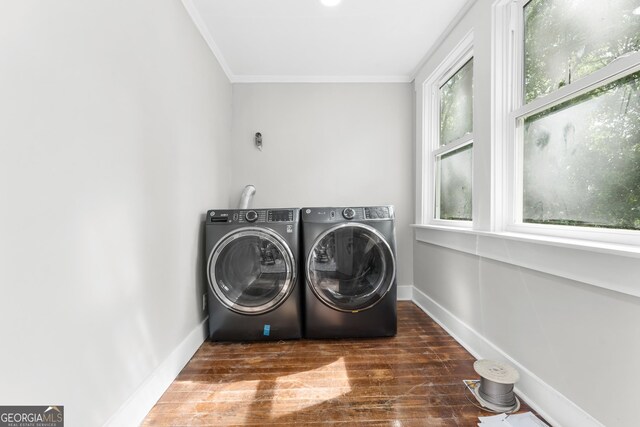 107 S Mulberry St, Statesboro, GA 30458 - washroom featuring washer and clothes dryer, crown molding, and wood finished floors