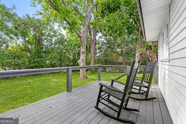 107 S Mulberry St, Statesboro, GA 30458 - wooden deck with a lawn