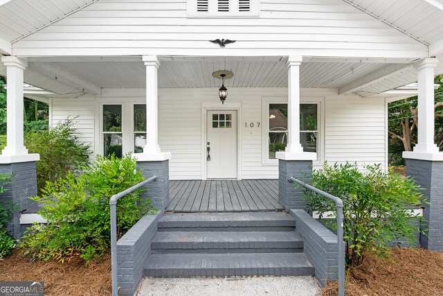 107 S Mulberry St, Statesboro, GA 30458 - view of exterior entry featuring covered porch