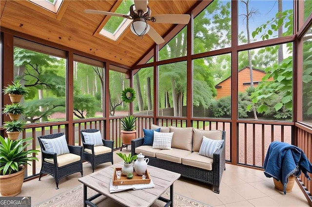 3007 Manning Dr, Marietta, GA 30062 - sunroom / solarium featuring a skylight, ceiling fan, lofted ceiling, and an outdoor hangout area