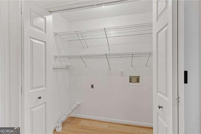 3007 Manning Dr, Marietta, GA 30062 - laundry room with washer hookup, light wood finished floors, and electric dryer hookup