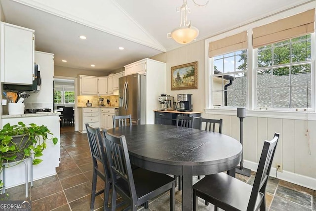 3734 Powers Ferry Rd NW, Atlanta, GA 30342 - dining room with vaulted ceiling, dark stone finish flooring, recessed lighting, and crown molding