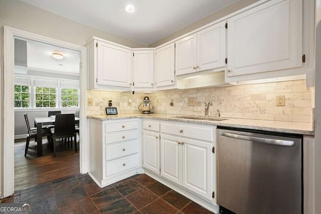 3734 Powers Ferry Rd NW, Atlanta, GA 30342 - kitchen with stainless steel dishwasher, a sink, white cabinetry, and light stone counters