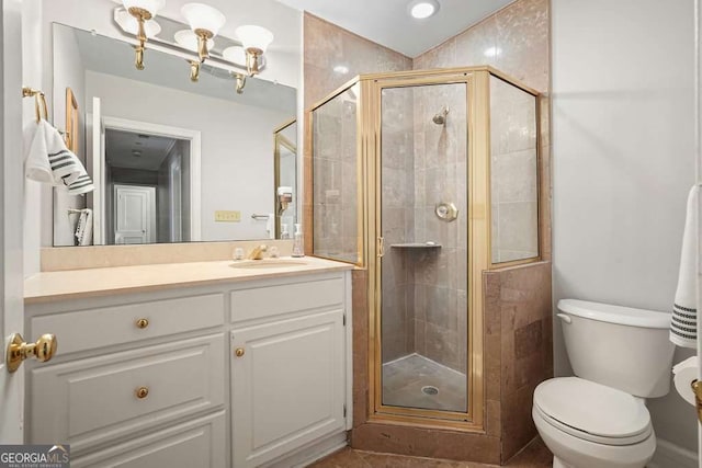 3734 Powers Ferry Rd NW, Atlanta, GA 30342 - full bath featuring a shower stall, vanity, toilet, and tile patterned flooring
