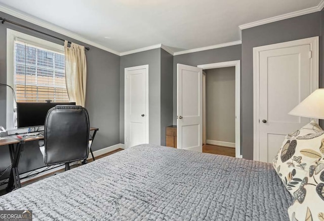 3734 Powers Ferry Rd NW, Atlanta, GA 30342 - bedroom featuring baseboards, crown molding, wood finished floors, and a desk