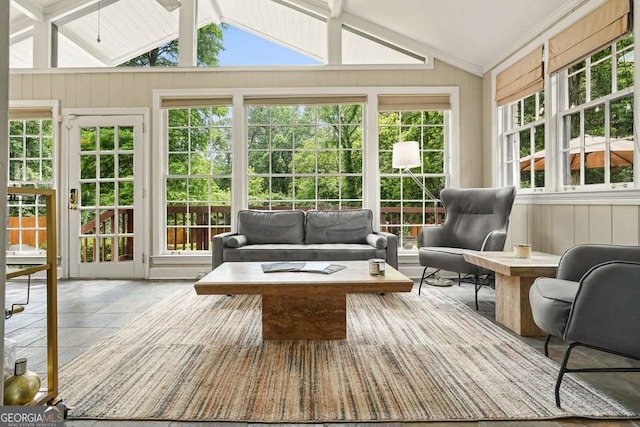 3734 Powers Ferry Rd NW, Atlanta, GA 30342 - sunroom / solarium featuring vaulted ceiling, stone tile floors, a wooden deck, and wood walls