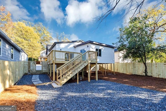 923 Smith St SW, Atlanta, GA 30310 - back of property with stairway, a fenced backyard, and a deck