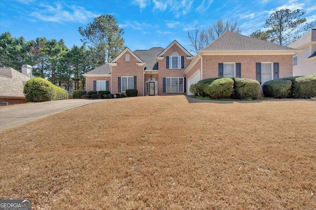 2021 Cockrell Pointe NW, Kennesaw, GA 30152 - traditional-style home with brick siding and a front yard