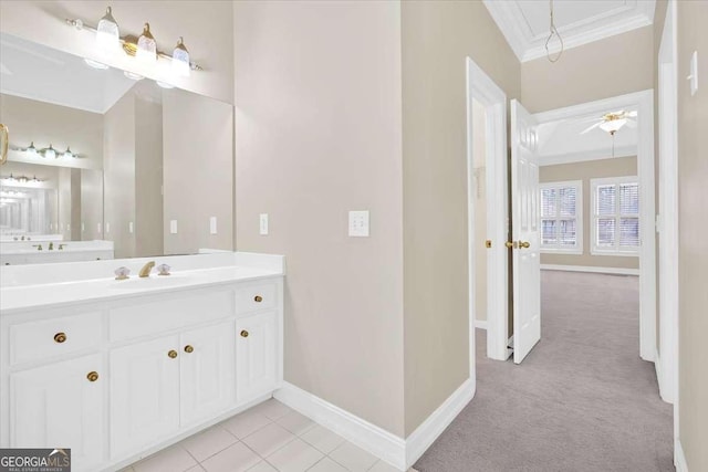 2021 Cockrell Pointe NW, Kennesaw, GA 30152 - bathroom with ornamental molding, baseboards, vanity, and ceiling fan