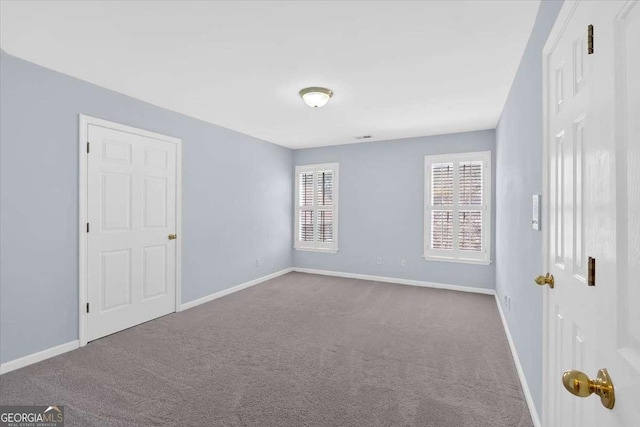 2021 Cockrell Pointe NW, Kennesaw, GA 30152 - unfurnished bedroom with carpet flooring and baseboards