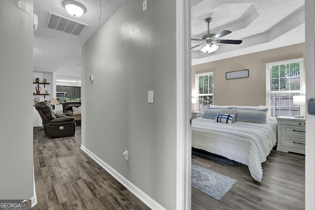 507 Hillcrest Cross Rd, Canton, GA 30115 - hallway featuring wood finished floors and a textured ceiling