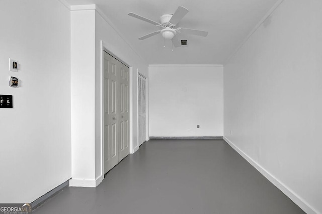 507 Hillcrest Cross Rd, Canton, GA 30115 - empty room with ceiling fan, crown molding, and concrete floors