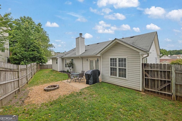 507 Hillcrest Cross Rd, Canton, GA 30115 - rear view of property with an outdoor fire pit, a patio area, a fenced backyard, and a chimney