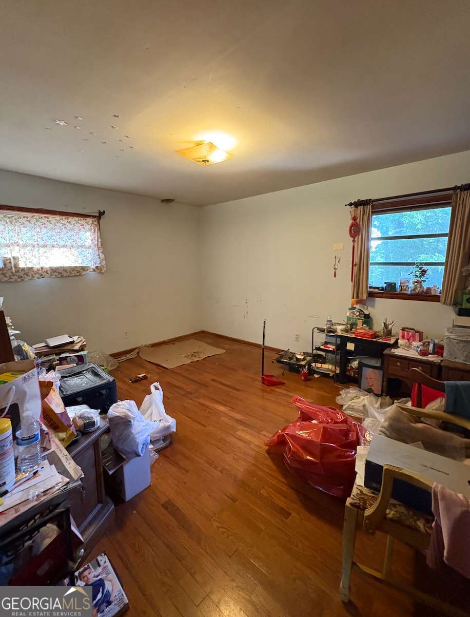 3838 Dunbury Ln, Decatur, GA 30032 - living area featuring wood finished floors