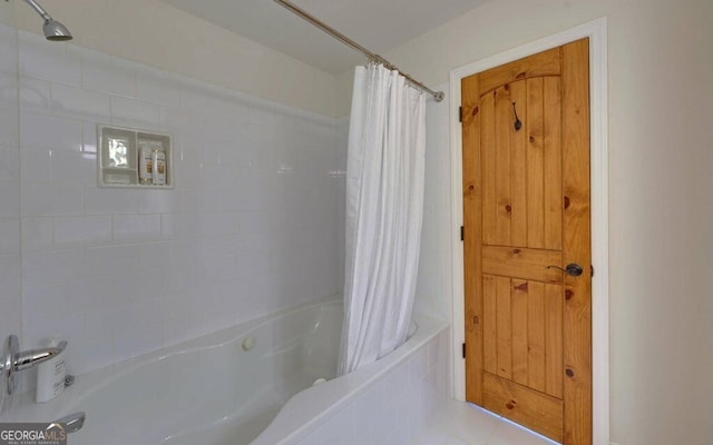 1951 Island View Dr, Hiawassee, GA 30546 - bathroom featuring shower / bath combo with shower curtain and tile patterned flooring