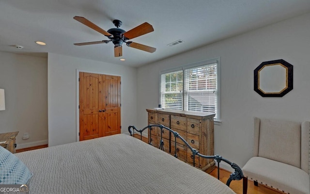 1951 Island View Dr, Hiawassee, GA 30546 - bedroom with wood finished floors, baseboards, recessed lighting, and ceiling fan