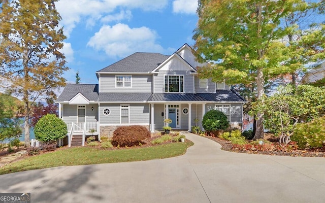 1951 Island View Dr, Hiawassee, GA 30546 - view of front of property featuring stone siding, a standing seam roof, and a porch